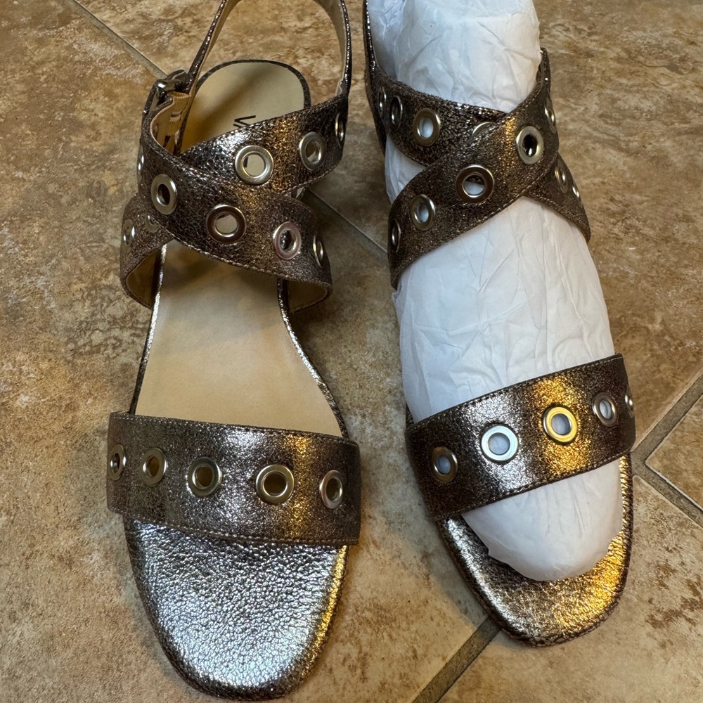 New in box gold/platino sandals.